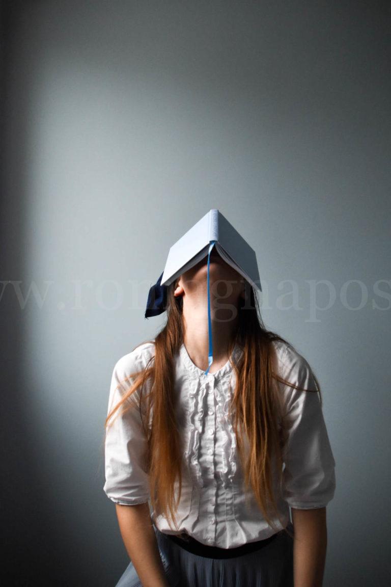 Woman in white long sleeve shirt wearing black and white cap